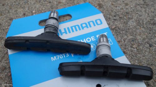 Verschlissener und neuer Bremsschuh für Shimano V-Brake im Vergleich